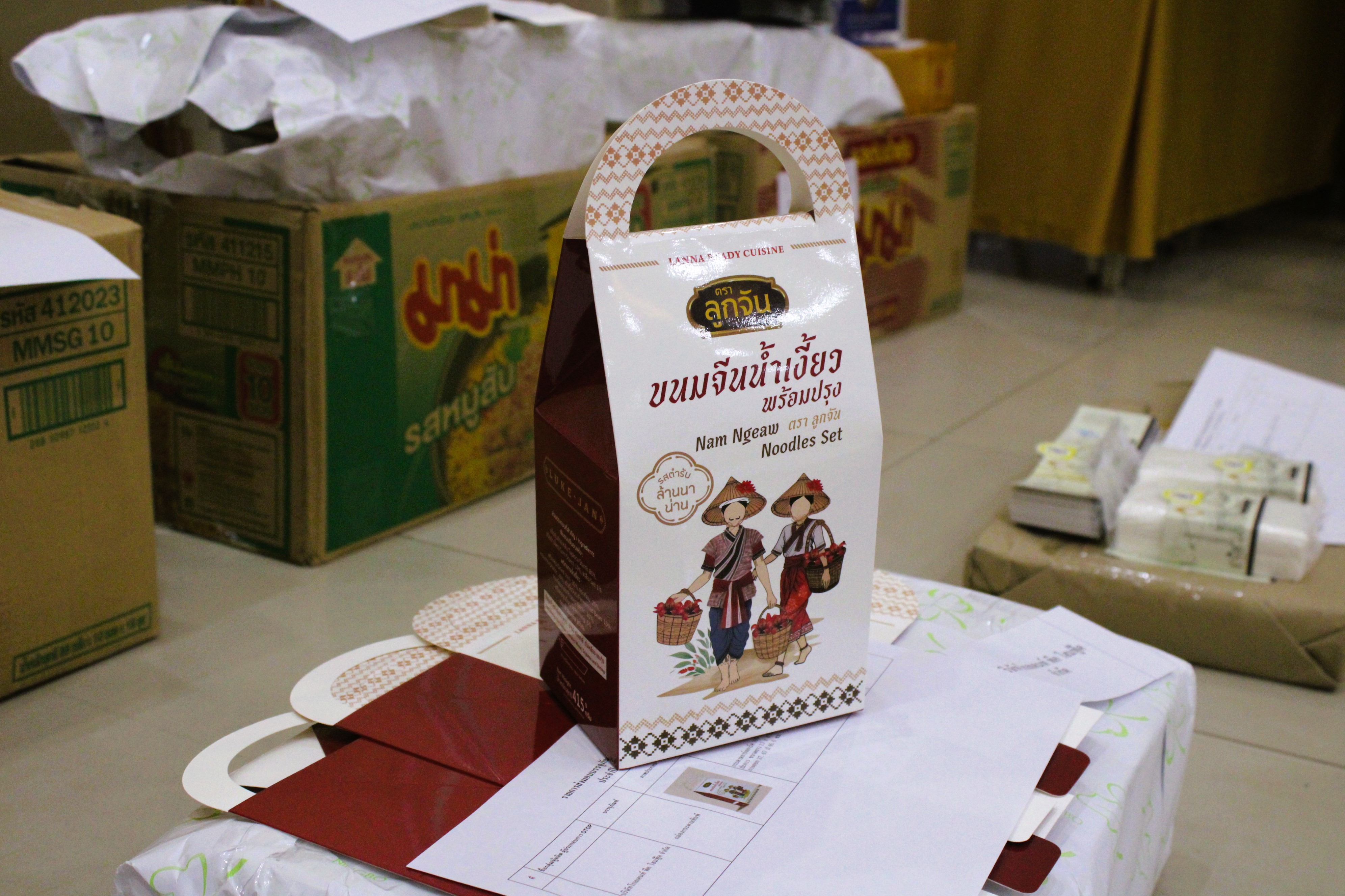 พช.น่าน ส่งมอบบรรจุภัณฑ์ โครงการพัฒนาผลิตภัณฑ์ OTOP น่าน สู่สากล หนุนชุมชนพัฒนาสินค้าพื้นถิ่นให้ก้าวไกล